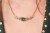 Colar Double Jaguar Ouro - Verde Esmeralda - comprar online