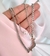 Collar doble perla estrella carita