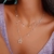 CHOKER DE ESTRELAS E PONTOS DE LUZ EM ZIRCÔNIA BANHADO NO RÓDIO SELENA - comprar online
