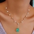COLAR DE GOTA TURMALINA PARAÍBA FUSION E PONTOS DE LUZ BANHADO A OURO JADE - comprar online