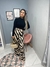 Calça de zebra detalhes bege e preto na internet