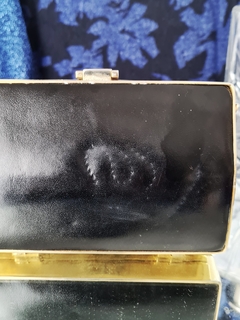 Cartera rigida con armazon dorado en internet