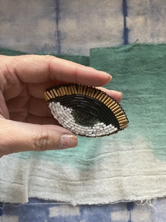 Broche Ojo dorado