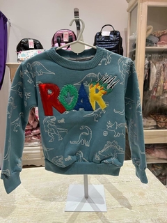 SHI - Buzo Dino brilla en la oscuridad celeste en internet