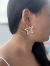 Brinco argola estrela grande folheado a ouro 18k dourada