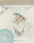 Anillo corazones de plata y cubics turquesas