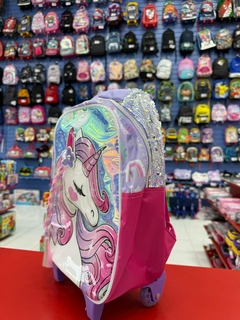 F1908 MOCHILA CON CARRO 14´ NENA UNICORNIO TRENZA (7792621128067) en internet