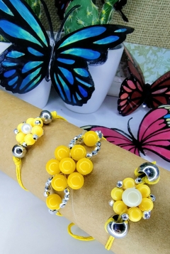 Pulseras tejidas flores amarillas