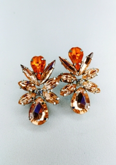 Aros de gemas color melocotón brillante y naranja