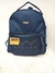 Mochilas grandes con bolsillo montado con tachas en Eco cuero