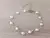 PULSERA DE ACERO PERLAS. LARGO 18 + 5 CM EXT.