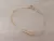 PULSERA DE ACERO DORADO ESLABÓN COLA DE RATÓN CON BOLITAS DE 3 MM CENTRALES. LARGO 19,5 CM