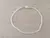 PULSERA DE ACERO BLANCO MALLA TUBULAR FINA. LARGO 19 CM.