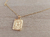 DIJE DE ACERO DORADO MEDALLA RECTANGULAR TRABAJADA EN RELIEVE CON INICIAL «P» Y CADENA ESPEJITO X 45 CM. TAMAÑO 15 X 20 MM
