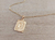 DIJE DE ACERO DORADO MEDALLA RECTANGULAR TRABAJADA EN RELIEVE CON INICIAL «F» Y CADENA ESPEJITO X 45 CM. TAMAÑO 15 X 20 MM