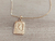 DIJE DE ACERO DORADO MEDALLA RECTANGULAR TRABAJADA EN RELIEVE CON INICIAL «A» Y CADENA ESPEJITO X 45 CM. TAMAÑO 15 X 20 MM