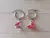 ARO DE ACERO ARGOLLA 14 MM CON MARIPOSA CON ACRÍLICO ROJO