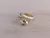 ANILLO DE ACERO DORADO VÍBORA DOBLE OJOS STRASS VERDE
