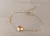 PULSERA DE ACERO DORADO ESPEJITO CON BOLITAS 3 MM Y CORAZÓN BOMBE CENTRAL. LARGO 16,5 CM + 5 CM EXT.