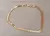 PULSERA DE ACERO DORADO ESLABÓN CONECTOR CILINDRO PLANO. LARGO 20,5 CM