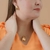 Colar gota lisa grande folheado a ouro 18k na internet