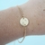 Pulseira com medalhas lisa e letra folheada a ouro 18k