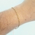 Pulseira fininha com elos folheada a ouro 18k