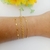 Pulseira fininha com hastes espaçadas folheada a ouro 18k - comprar online