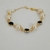 Pulseira de pérolas com pedra preta folheada a ouro 18k na internet