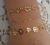 Pulseira de coração vazado e trabalhado folheada a ouro 18k - comprar online