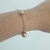Pulseira de bolinhas lisas e foscas folheada a ouro 18k na internet