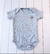 Body americano liso manga corta gris melange