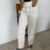 Jeans Mom Oblicuo Crudo