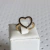 Anel Banhado em Ouro 18k, com Coração Cravejado de Zircônias Pretas - comprar online