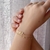 Pulseira Banhada em Ouro 18k, com Pontos de Luz de Zircônias