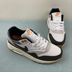 Nike Air Max 1 Athletic Department Light Bone University Gold na internet