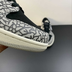 Jordan 1 Retro Low OG Black Cement - comprar online