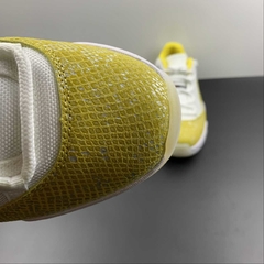 Jordan 11 Retro Low Tour Yellow Snakeskin na internet