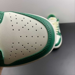 Nike Dunk Low Malachite University Gold na internet