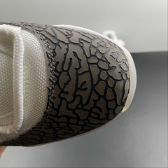 Jordan 11 Low Cement Grey na internet