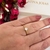 ANEL SOLITÁRIO SEIS GARRA 7MM FOLHEADO EM OURO 18K