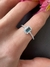 Anel ouro branco com topázio azul retangular 3x5 e 38 diamantes 1mm na internet