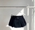 SHORTS POLLERA