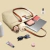 A01858 - Bolso de mano Versatile T23 para notebook 14" (Khaki) - TOMTOC - tienda online