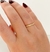 Anel meia aliança c / zircônias redondas - banhado a ouro 18k - comprar online