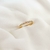 Anel meia aliança c / zircônias redondas - banhado a ouro 18k