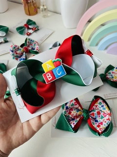Laços escolar G (12cm) ou M (9cm)- unidade- presilha na internet