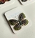 Broche borboleta verde limão