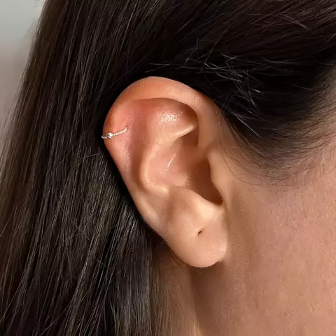 Piercing Aro Torcido Com Bolinha - comprar online