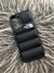 Funda puffer Northface black en internet